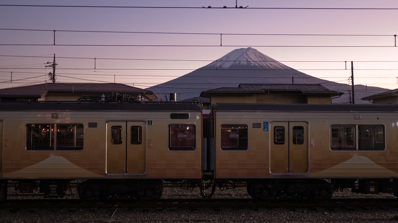 beige train during day Go Japan Now - Explore & Experience Japan