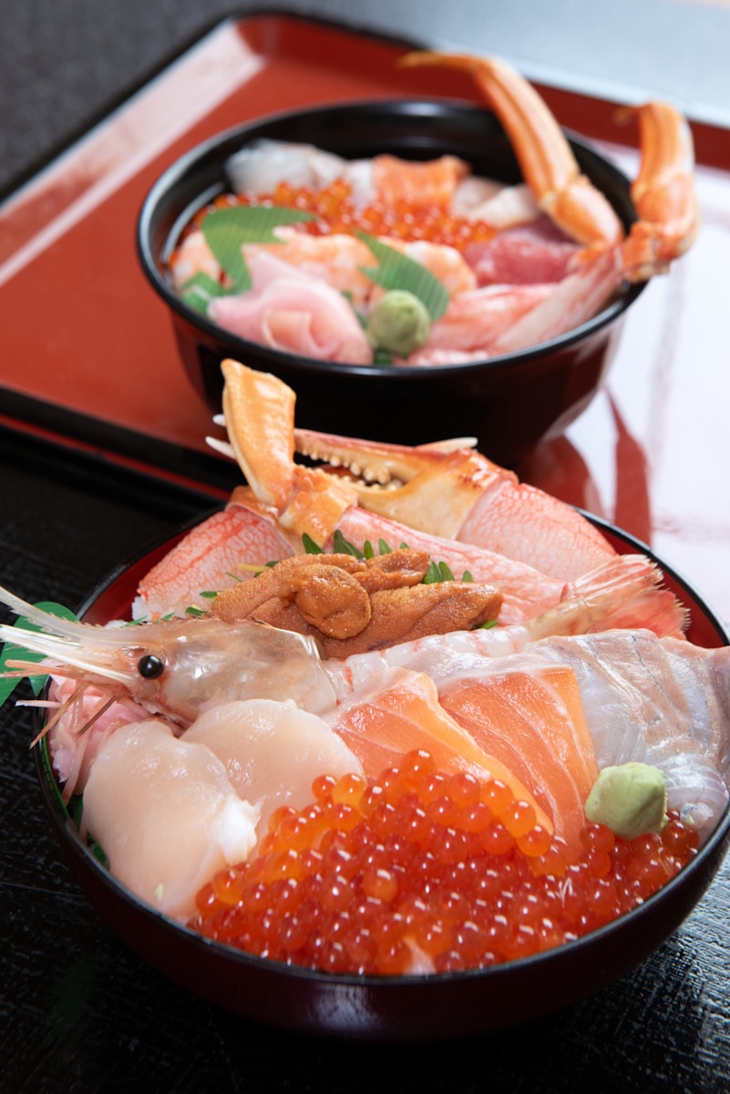 A close up of two bowls of food on a table
