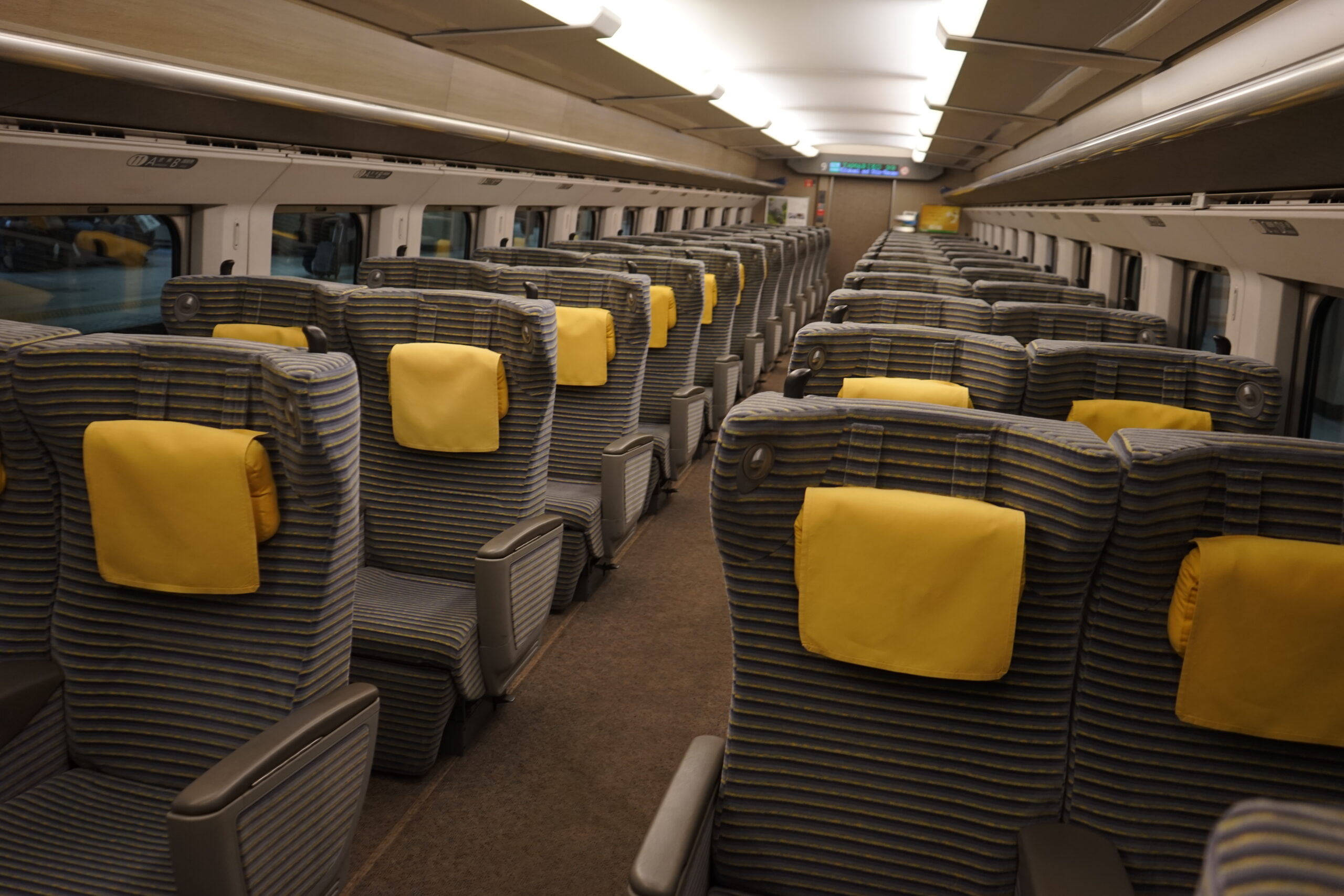 Green Car seats on a Japanese train