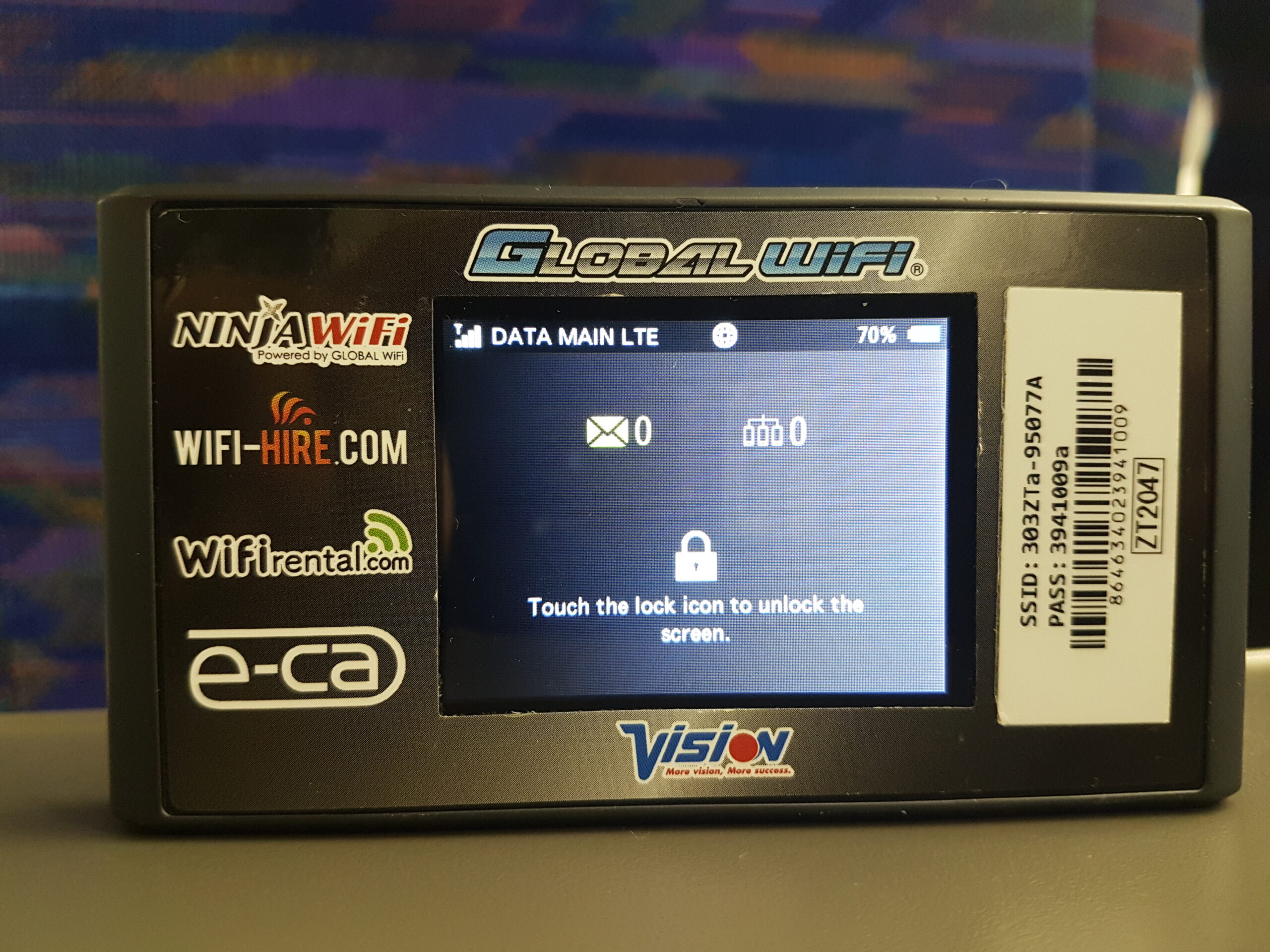 Pocket WiFi router and smartphone side by side while planning a trip in Japan